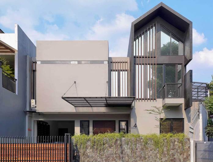 Desain rumah modern dengan cahaya alami karya Kad Firma Arsitektur via arsitag.com